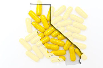 Image showing Outline California map of with transparent pills in the backgrou