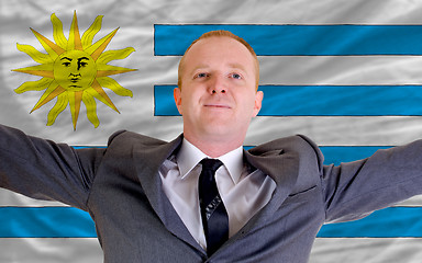 Image showing happy businessman because of profitable investment in uruguay st