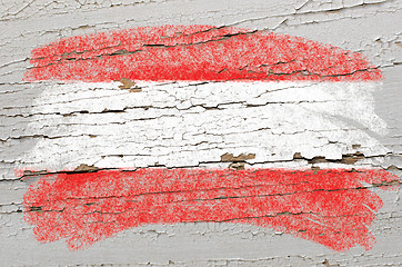 Image showing flag of Austria on grunge wooden texture painted with chalk  