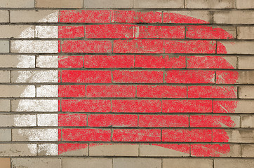 Image showing flag of bahrain on grunge brick wall painted with chalk  