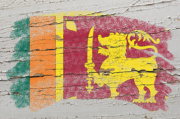 Image showing flag of  srilanka on grunge wooden texture painted with chalk  