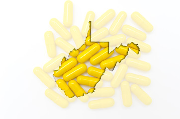 Image showing Outline map of west virginia with transparent pills in the backg