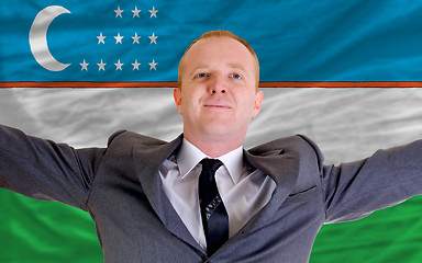 Image showing happy businessman because of profitable investment in uzbekistan