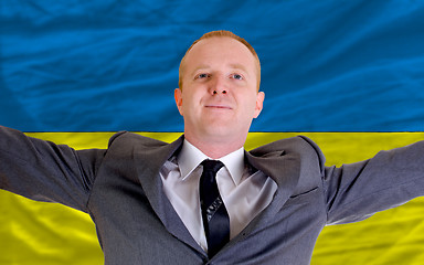 Image showing happy businessman because of profitable investment in ukraine st