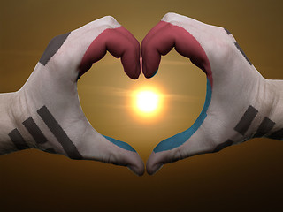 Image showing Heart and love gesture by hands colored in south korea flag duri