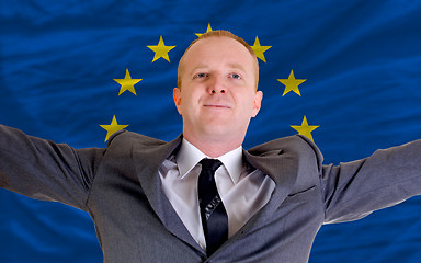 Image showing happy businessman because of profitable investment in europe sta