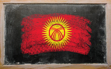 Image showing flag of kyrghyzstan on blackboard painted with chalk  