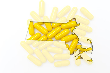 Image showing Outline map of Massachusetts with transparent pills in the backg