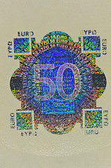 Image showing hologram protection on 50 euro banknote