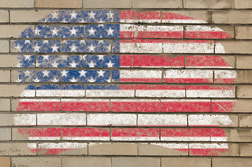 Image showing flag of USA on grunge brick wall painted with chalk  