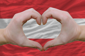 Image showing Heart and love gesture showed by hands over flag of Austria back