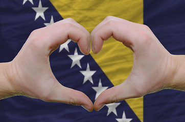 Image showing Heart and love gesture showed by hands over flag of bosnia herze