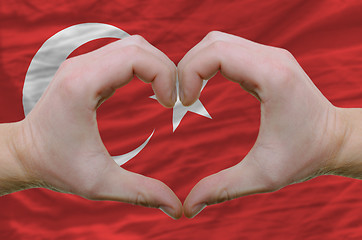 Image showing Heart and love gesture showed by hands over flag of turkey backg