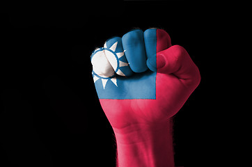 Image showing Fist painted in colors of taiwan flag