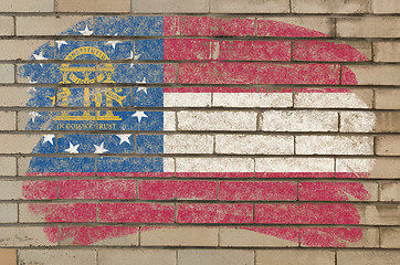 Image showing flag of georgia on grunge brick wall painted with chalk  