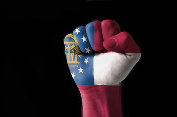 Image showing Fist painted in colors of great georgia flag