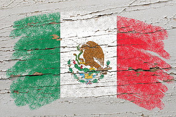 Image showing flag of mexico on grunge wooden texture painted with chalk  