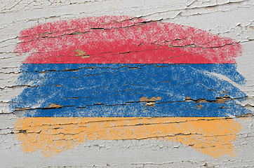 Image showing flag of armenia on grunge wooden texture painted with chalk  
