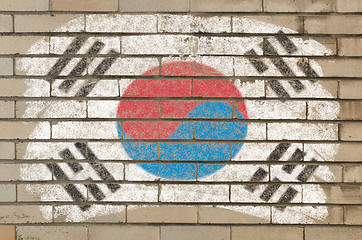 Image showing flag of South Korea on grunge brick wall painted with chalk  