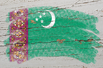 Image showing flag of turkmenistan on grunge wooden texture painted with chalk