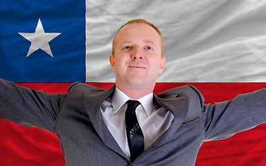 Image showing happy businessman because of profitable investment in chile stan