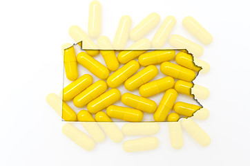 Image showing Outline map of pennsylvania with transparent pills in the backgr