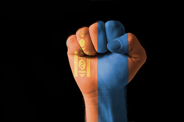 Image showing Fist painted in colors of mongolia flag