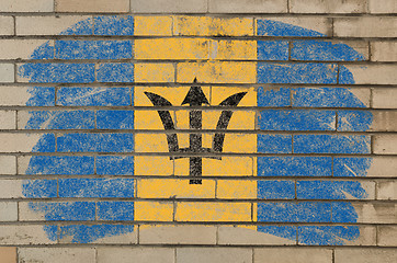 Image showing flag of Barbados on grunge brick wall painted with chalk  