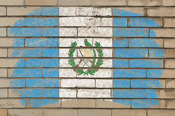 Image showing flag of guatemala on grunge brick wall painted with chalk  