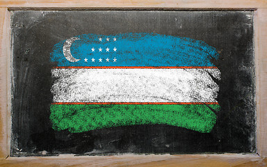 Image showing flag of uzbekistan on blackboard painted with chalk  