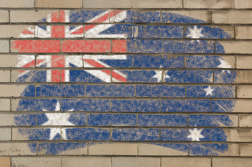 Image showing flag of Australia on grunge brick wall painted with chalk  