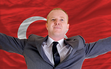 Image showing happy businessman because of profitable investment in turkey sta