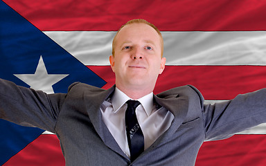 Image showing happy businessman because of profitable investment in puertorico