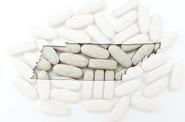 Image showing Outline map of south tennessee with transparent pills in the bac