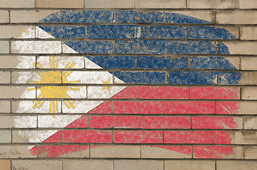 Image showing flag of phillipines on grunge brick wall painted with chalk  