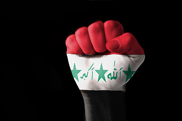 Image showing Fist painted in colors of iraq flag