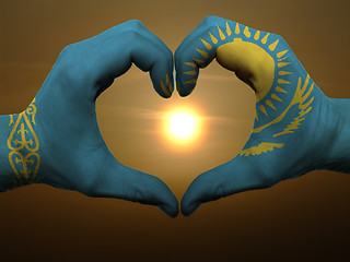 Image showing Heart and love gesture by hands colored in kazakstan flag during