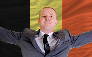 Image showing happy businessman because of profitable investment in belgium st