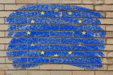Image showing flag of EU on grunge brick wall painted with chalk  