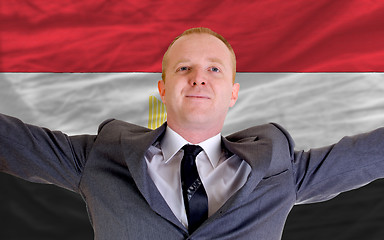 Image showing happy businessman because of profitable investment in egypt stan