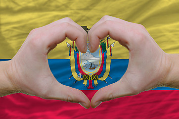 Image showing Heart and love gesture showed by hands over flag of ecuador back