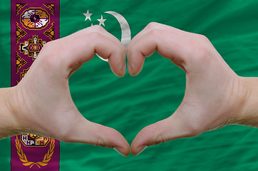 Image showing Heart and love gesture showed by hands over flag of turkmenistan