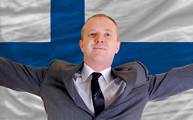 Image showing happy businessman because of profitable investment in finland st