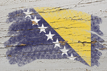 Image showing flag of bosnia and herzegovina on grunge wooden texture painted 