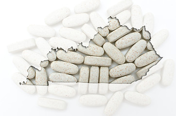 Image showing Outline map of Kentucky with transparent pills in the background