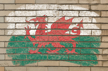 Image showing flag of wales on grunge brick wall painted with chalk  