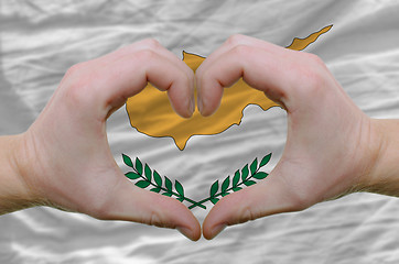Image showing Heart and love gesture showed by hands over flag of cyprus backg