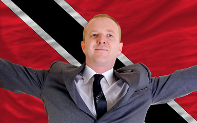 Image showing happy businessman because of profitable investment in trinidad t