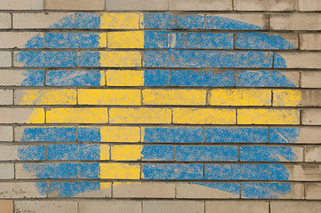 Image showing flag of Sweden on grunge brick wall painted with chalk  