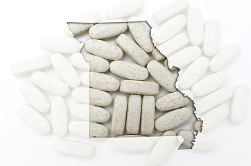 Image showing Outline map of missouri with transparent pills in the background